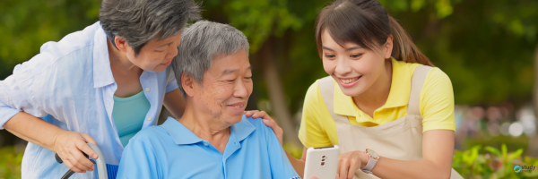 aged care worker and two old people
