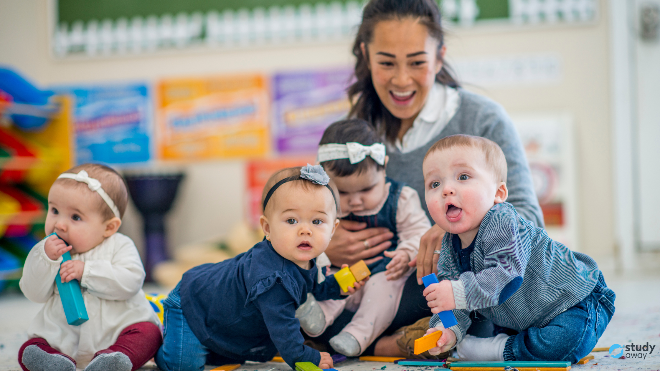 A woman with four babies